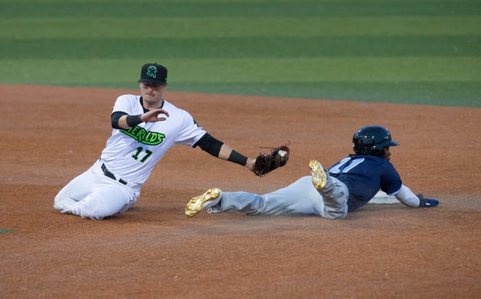 SF Giants prospect Tyler Fitzgerald attempts to tag D.J. Burt. (2021)